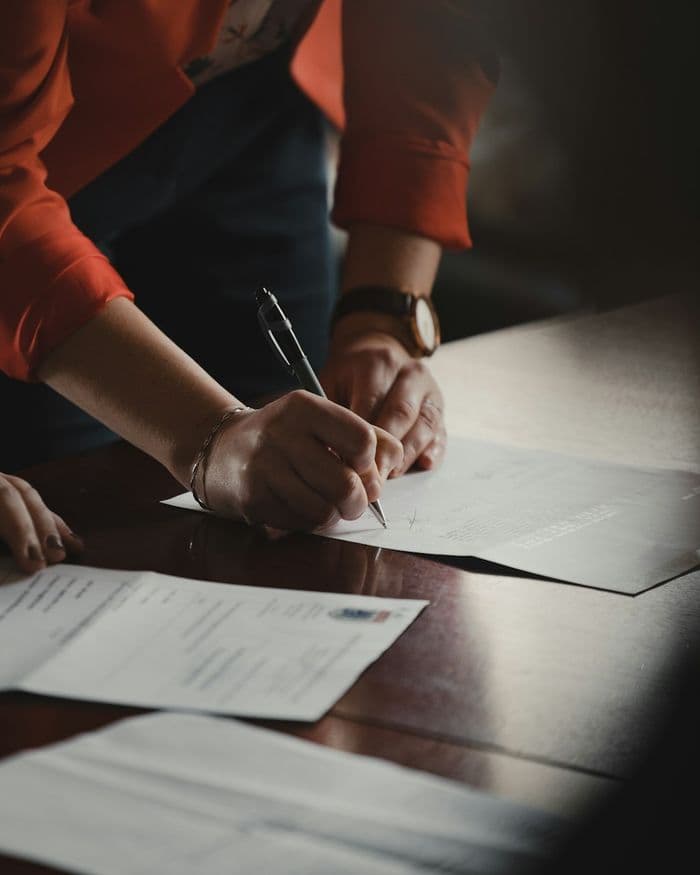 Client signing an important document